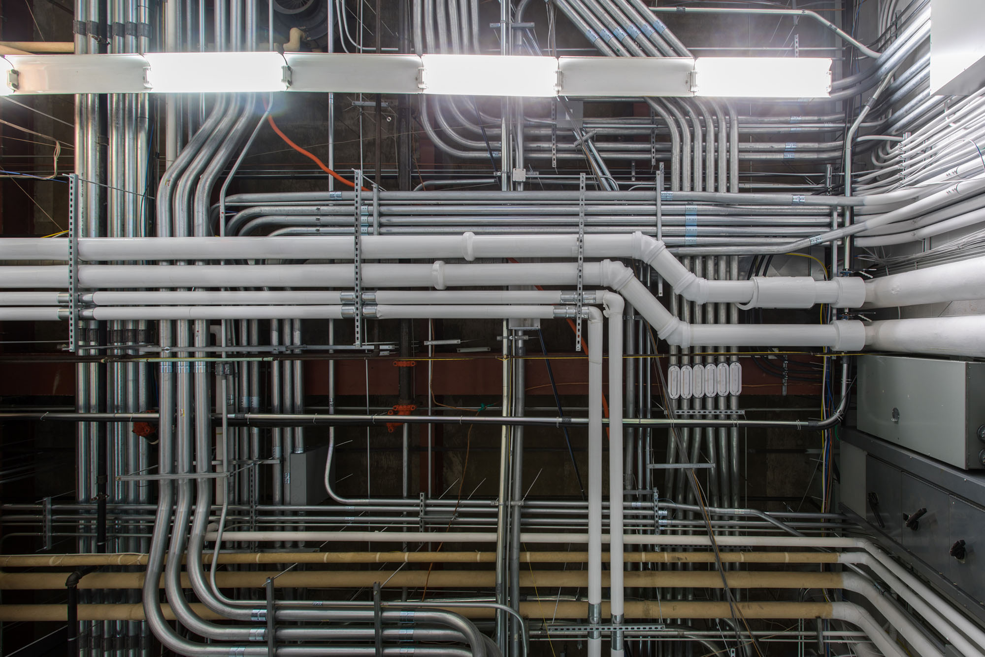Complex but well-organized electrical conduit run