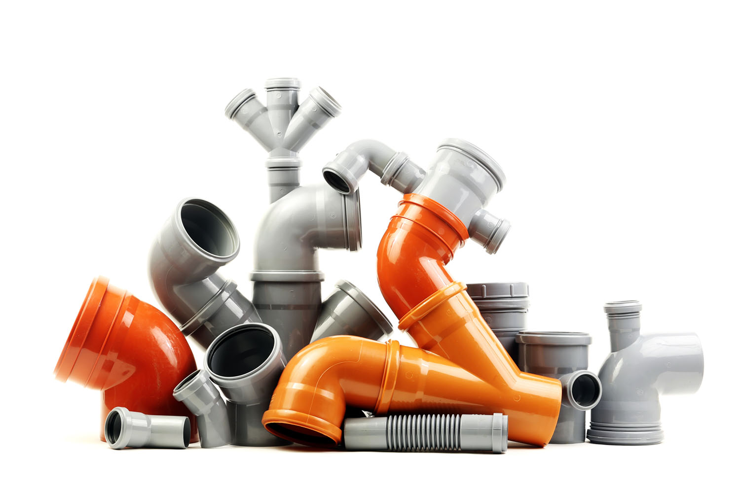Stack of orange and grey PVC electrical fittings